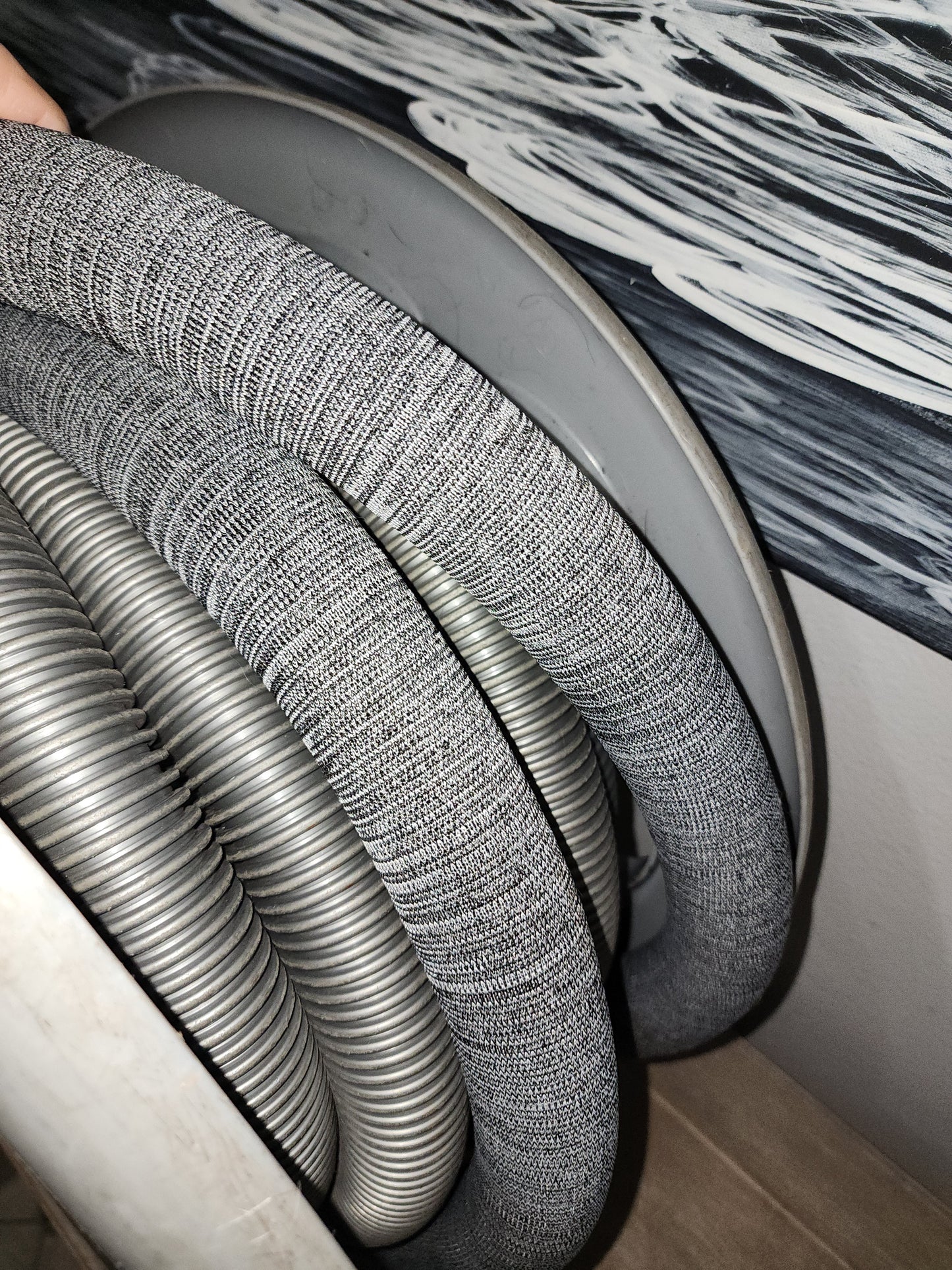 VACUUM "Sock". SOFT 6 foot knit section that fits all size hoses. ONLY VAC HOSE PROTECTION THAT WORKS WITH SELF RETRACTING REELS