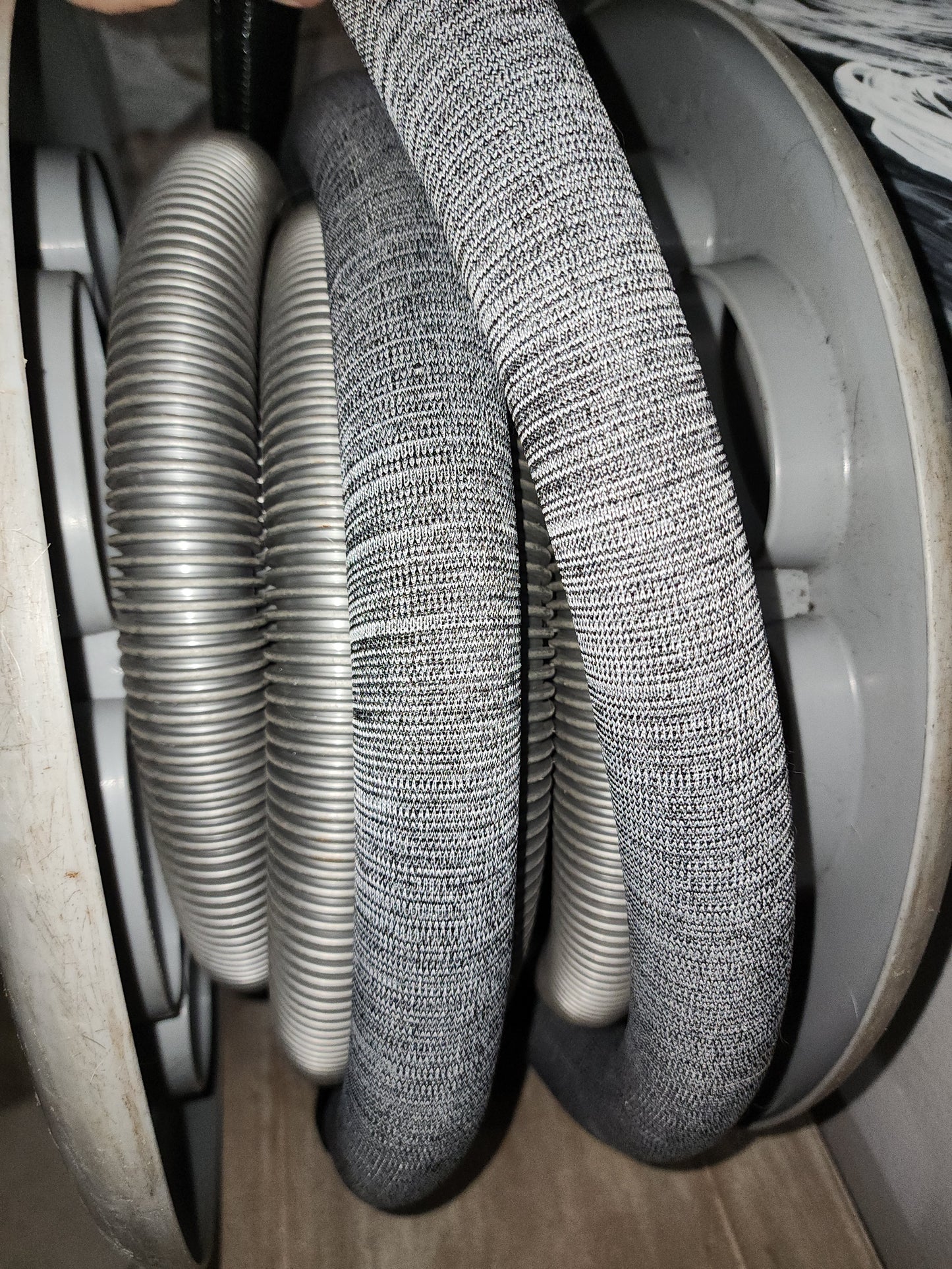 VACUUM "Sock". SOFT 6 foot knit section that fits all size hoses. ONLY VAC HOSE PROTECTION THAT WORKS WITH SELF RETRACTING REELS